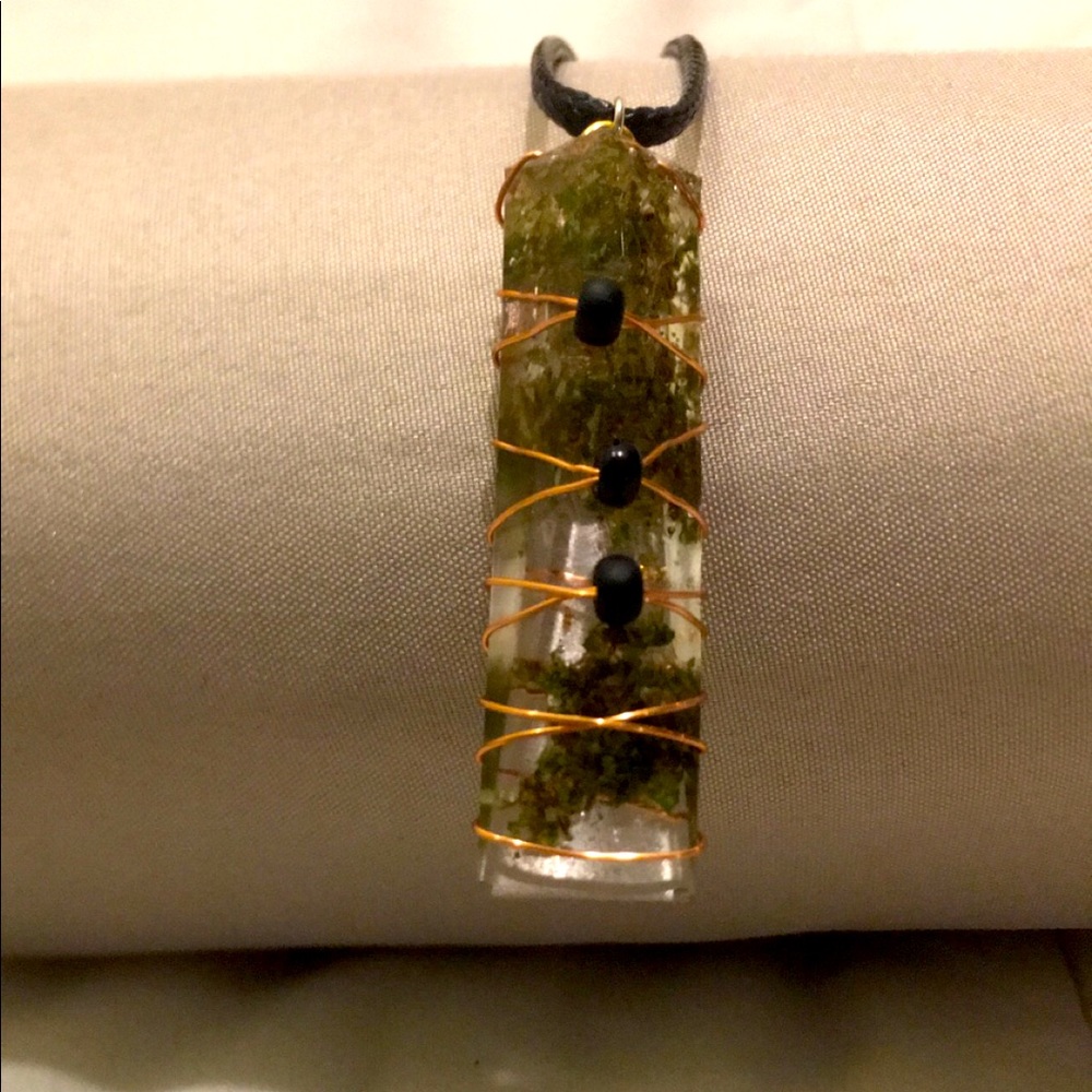 Necklace with hemp filled pendant